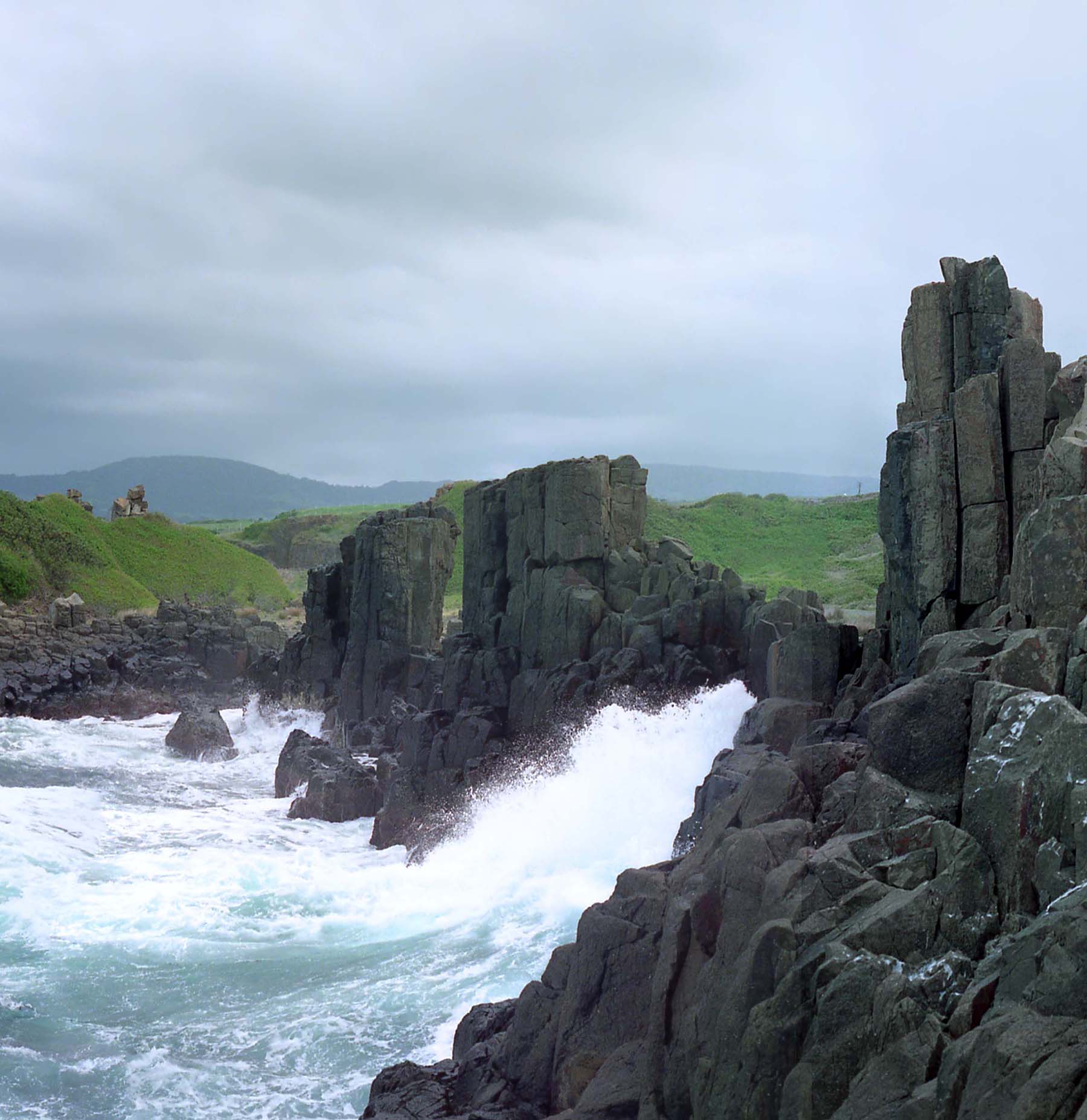 View of the rocks and surf at Bombo Quarry, located in Kiama.