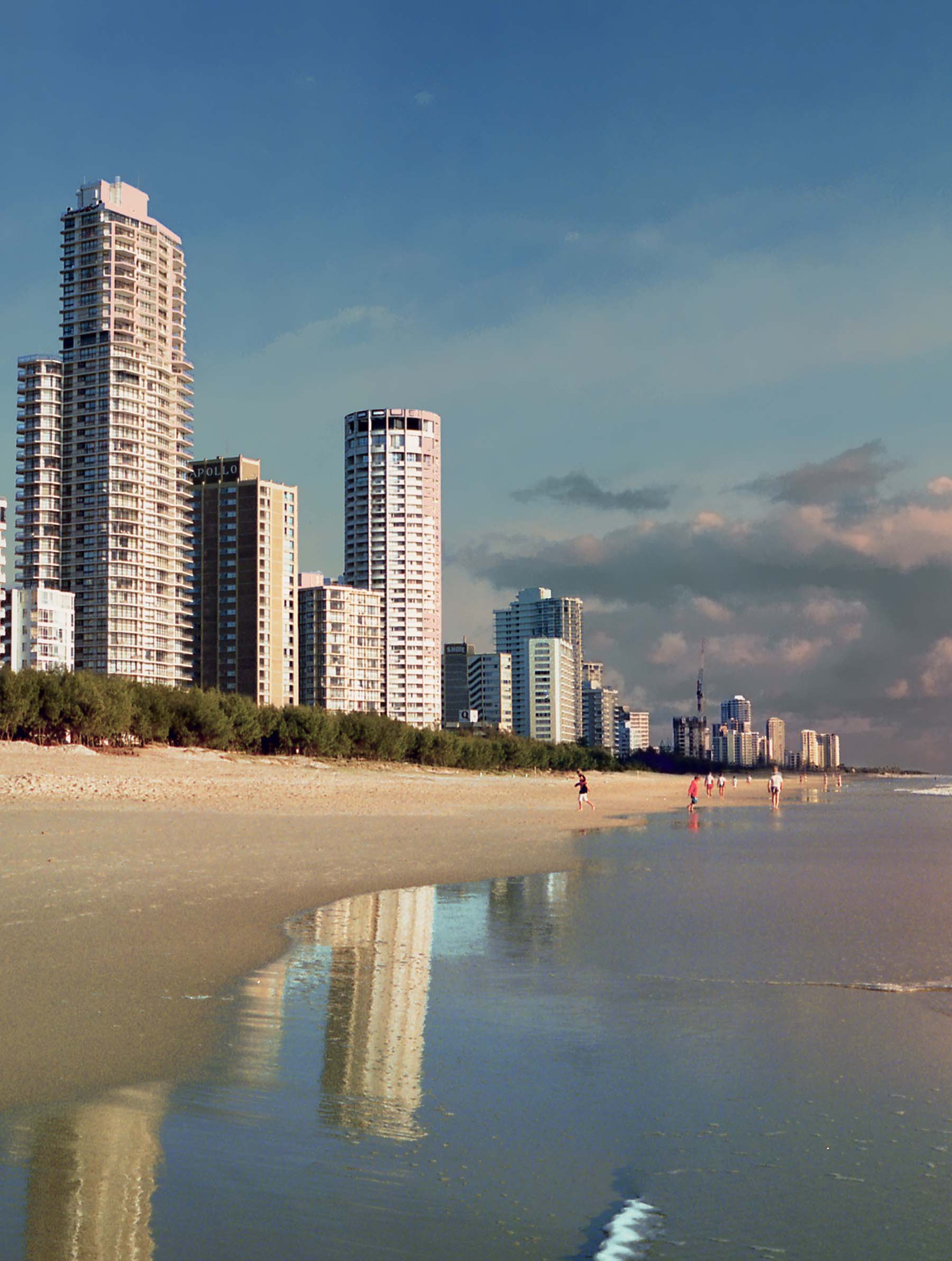 View of the people in the distance walking along Australia's Gold Coast.