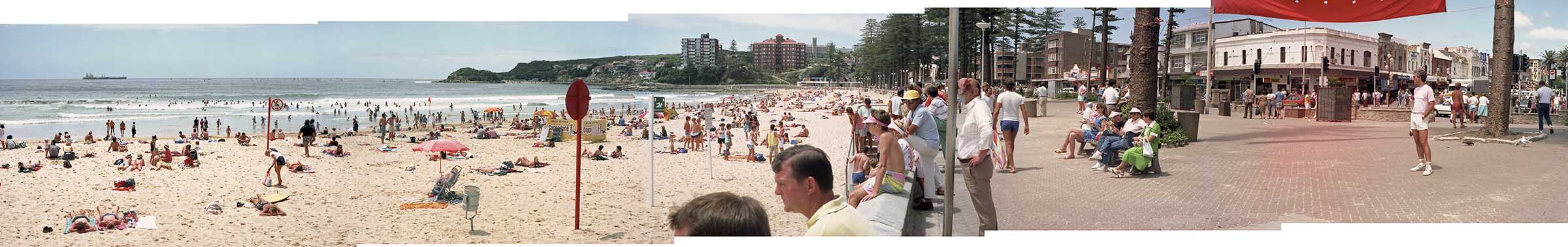 View of Manly Beach with the summer crowd enjoying the sun.