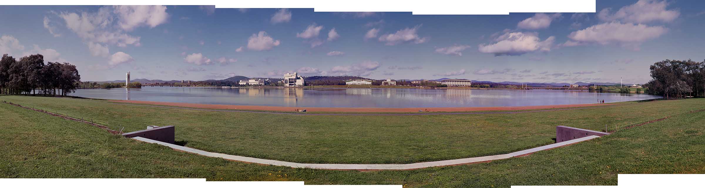 Lake Burley Griffen and government buildings in the distance, including Parliament House, in Canberra.