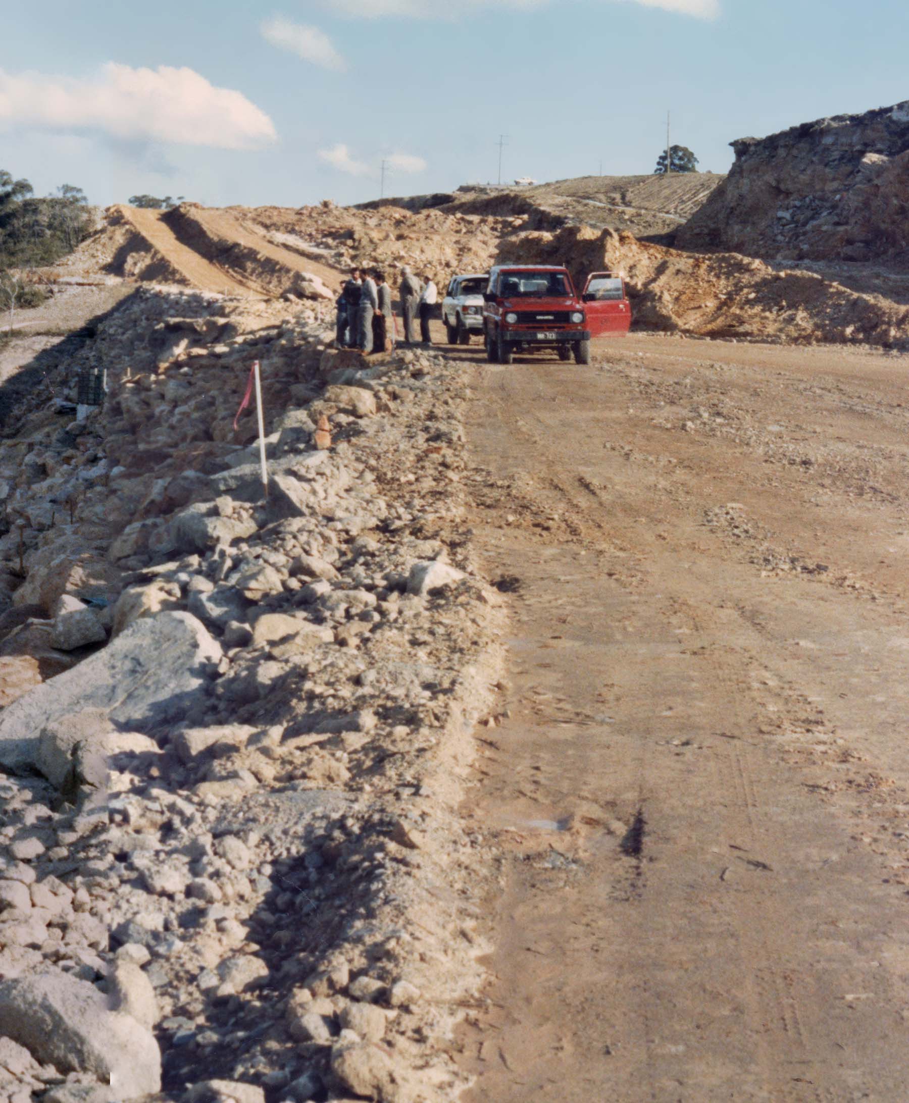 Officials from Department of Main Roads and Department of Planning at construction of the M1 freeway north of Sydney.