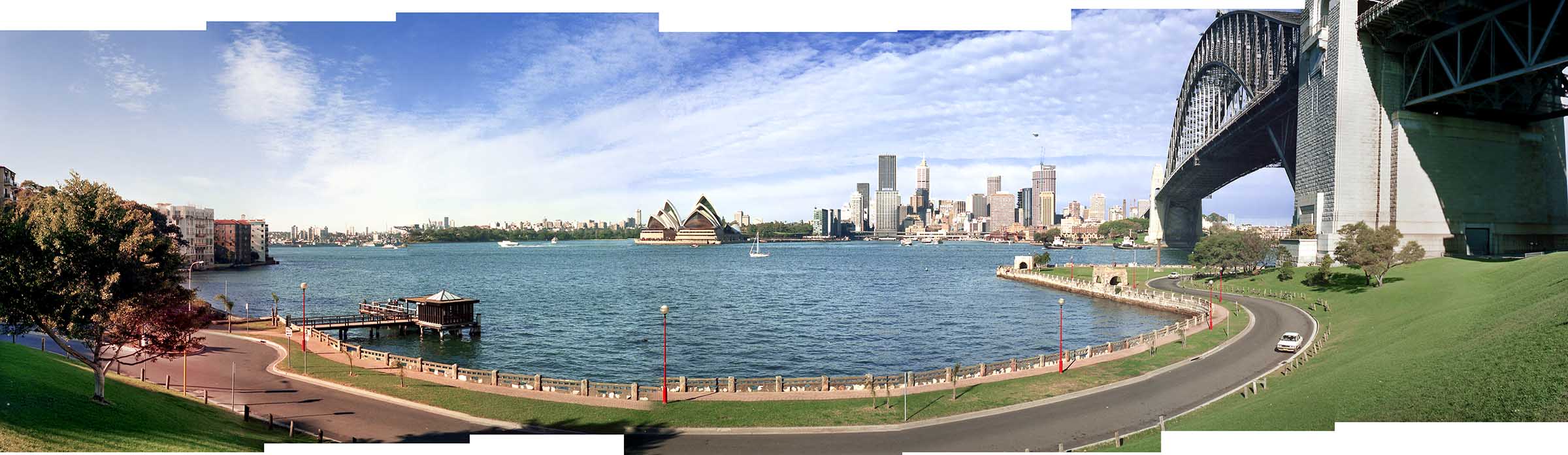 View of Sydney city skyline from the north shore of the Harbour near the Sydney Harbour Bridge.