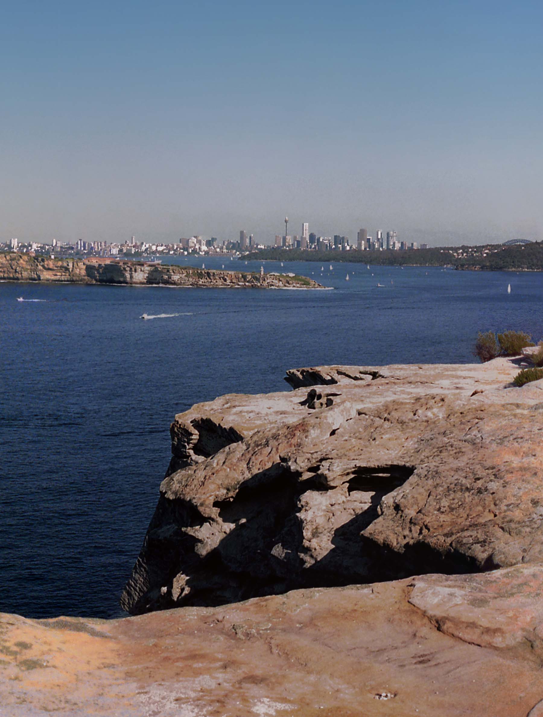 View of the Sydney skyline in the distance from North Head, on a chilly and early Sunday morning in July.